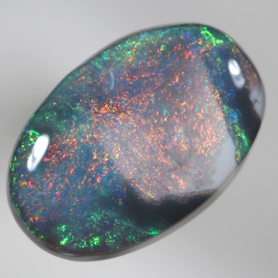 SOLID BLACK OPAL Unusual pattern, burning red bordered by black opal and sparkling green